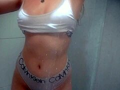 Hot teen 18+ taking shower wearing a white lingerie