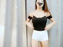 female host dances with camel toe
