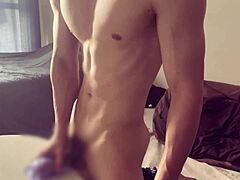 muscular bodybuilder keeps stroking to climax