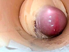 whoa camera shoved deep in shaved tight pussy catches monster cum blast??